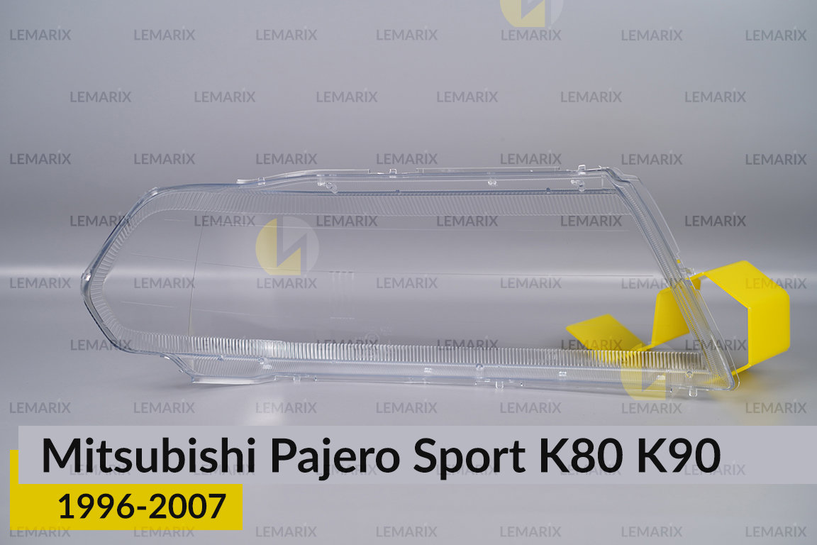Стекло фары Mitsubishi Pajero Sport K80 K90 (1996-2007) левое