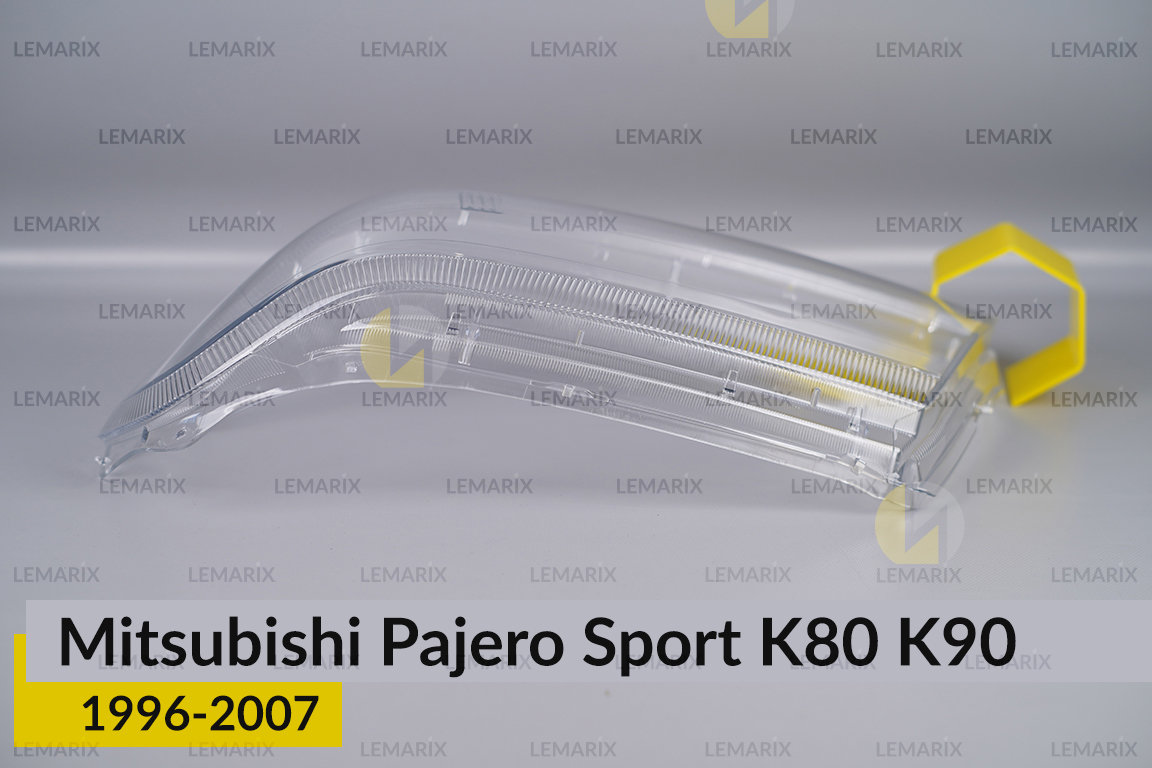 Стекло фары Mitsubishi Pajero Sport K80 K90 (1996-2007) левое