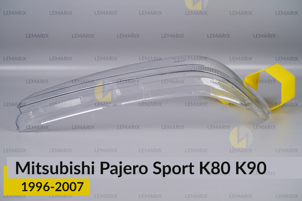 Стекло фары Mitsubishi Pajero Sport K80 K90 (1996-2007) левое