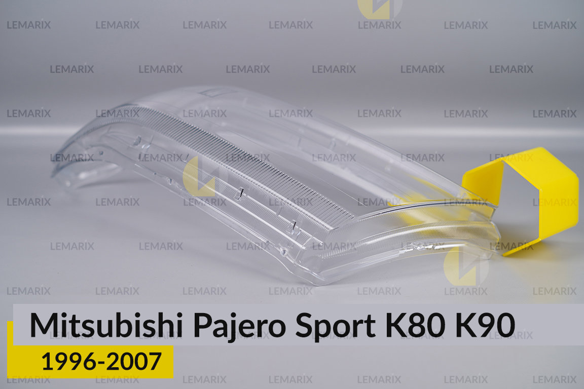 Стекло фары Mitsubishi Pajero Sport K80 K90 (1996-2007) левое