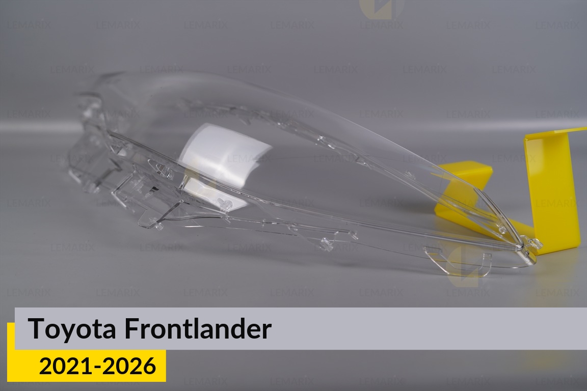 Скло фари Toyota Frontlander (2021-2026) ліве