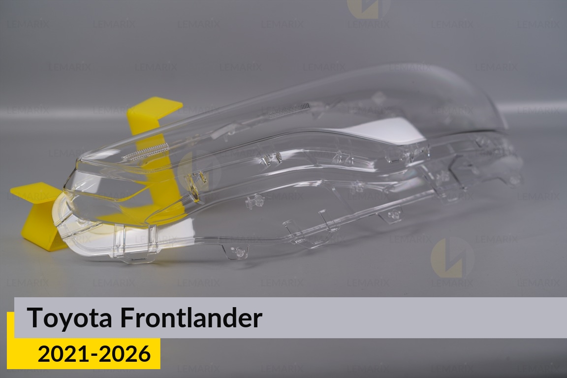 Скло фари Toyota Frontlander (2021-2026) ліве