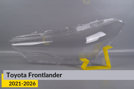 Скло фари Toyota Frontlander (2021-2026) ліве