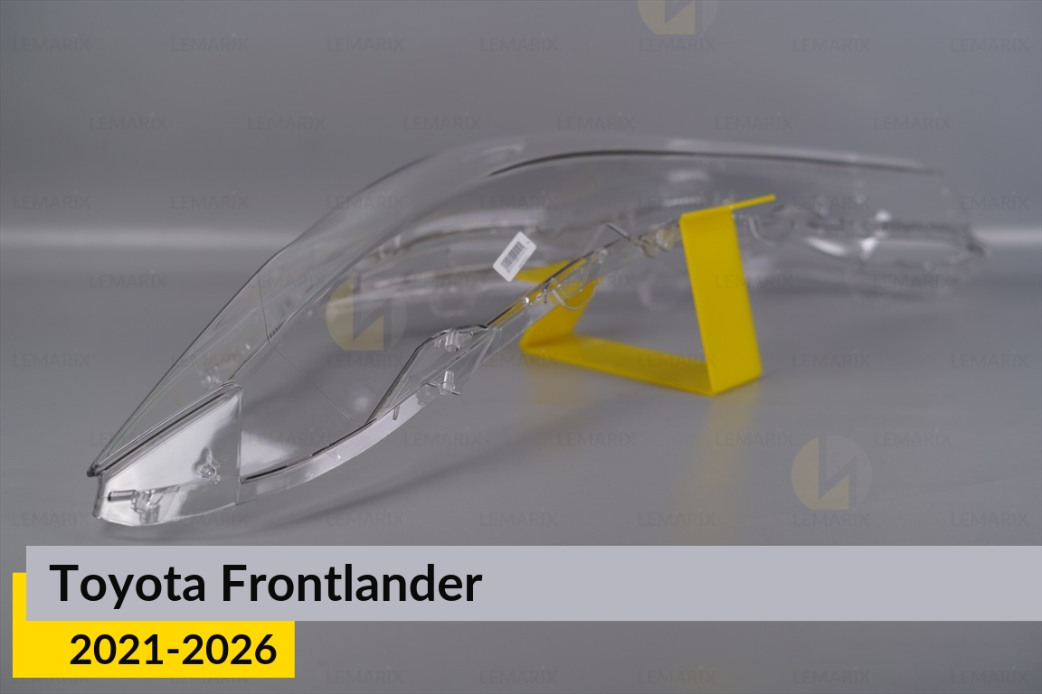 Скло фари Toyota Frontlander (2021-2026) ліве