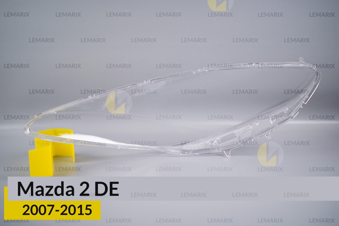 Стекло фары Mazda 2 DE (2007-2015) левое