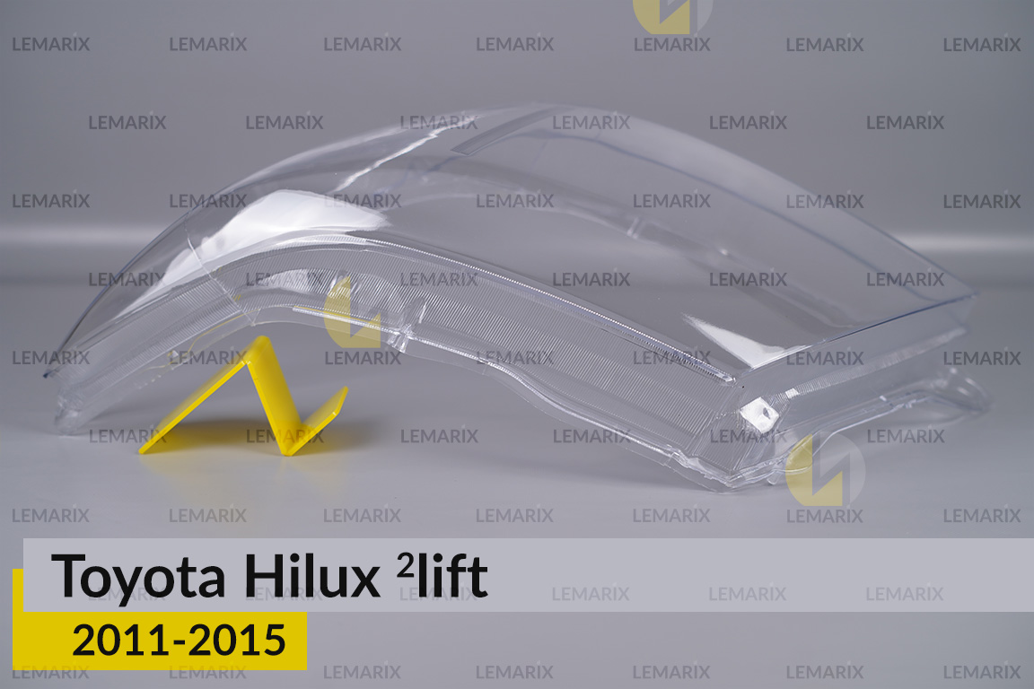 Стекло фары Toyota Hilux (2011-2015) 2 рест левое