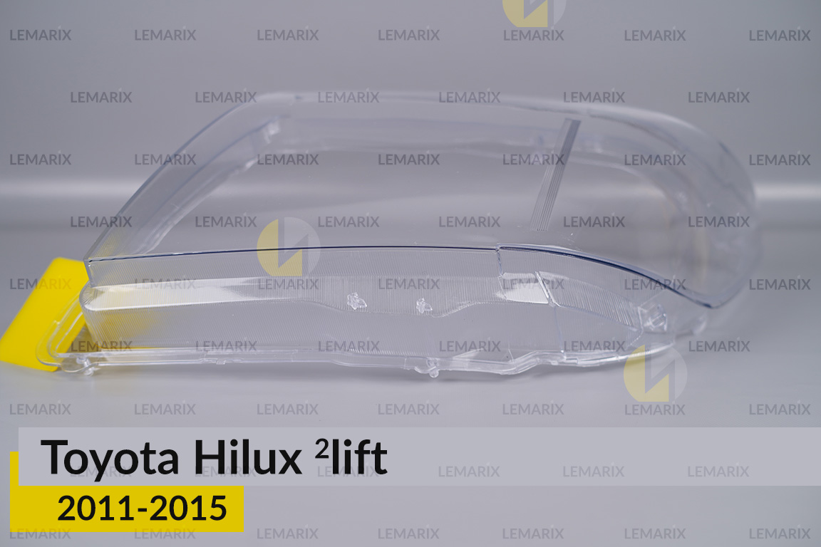 Стекло фары Toyota Hilux (2011-2015) 2 рест левое