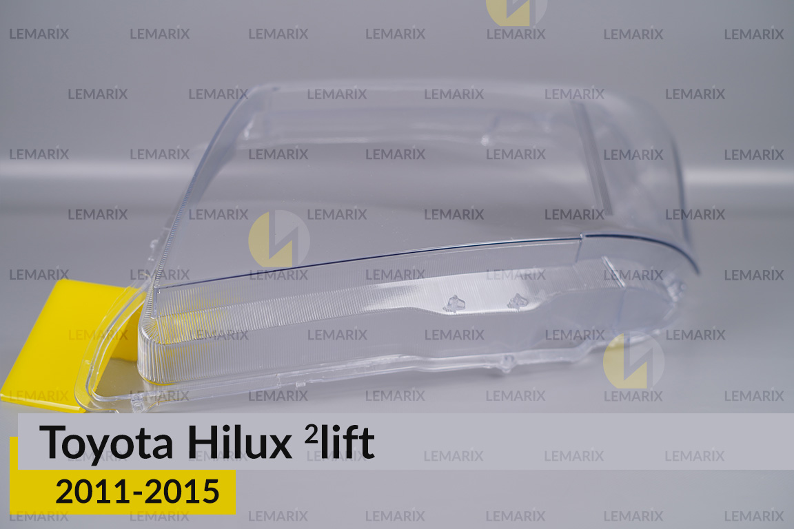 Стекло фары Toyota Hilux (2011-2015) 2 рест левое