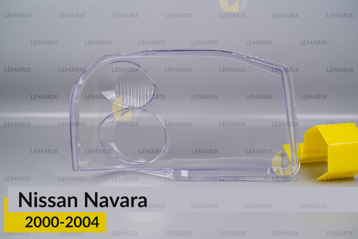 Стекло фары Nissan Navara (2000-2004) левое