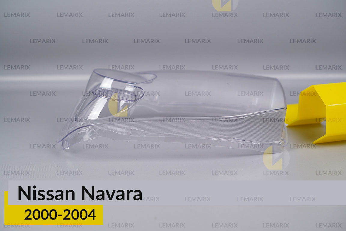 Стекло фары Nissan Navara (2000-2004) левое