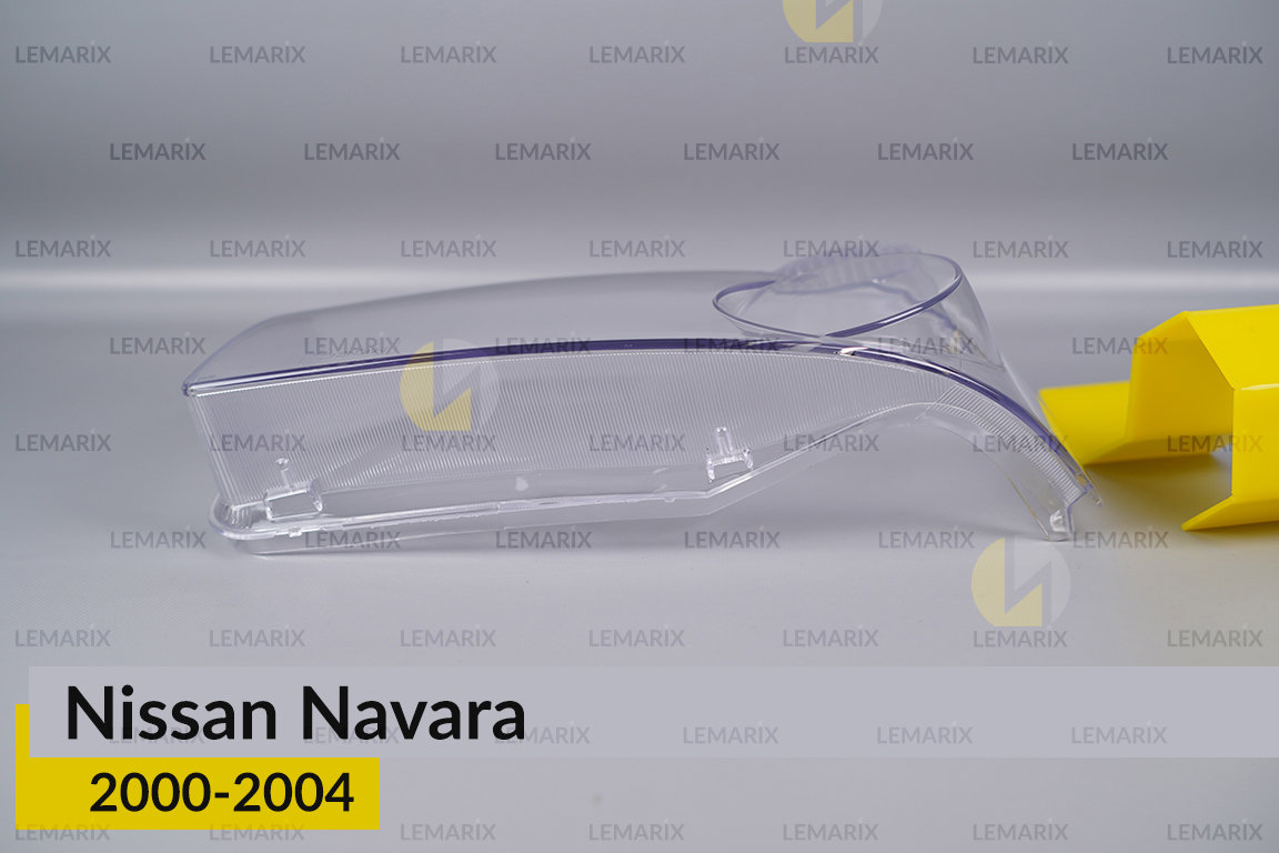Стекло фары Nissan Navara (2000-2004) левое