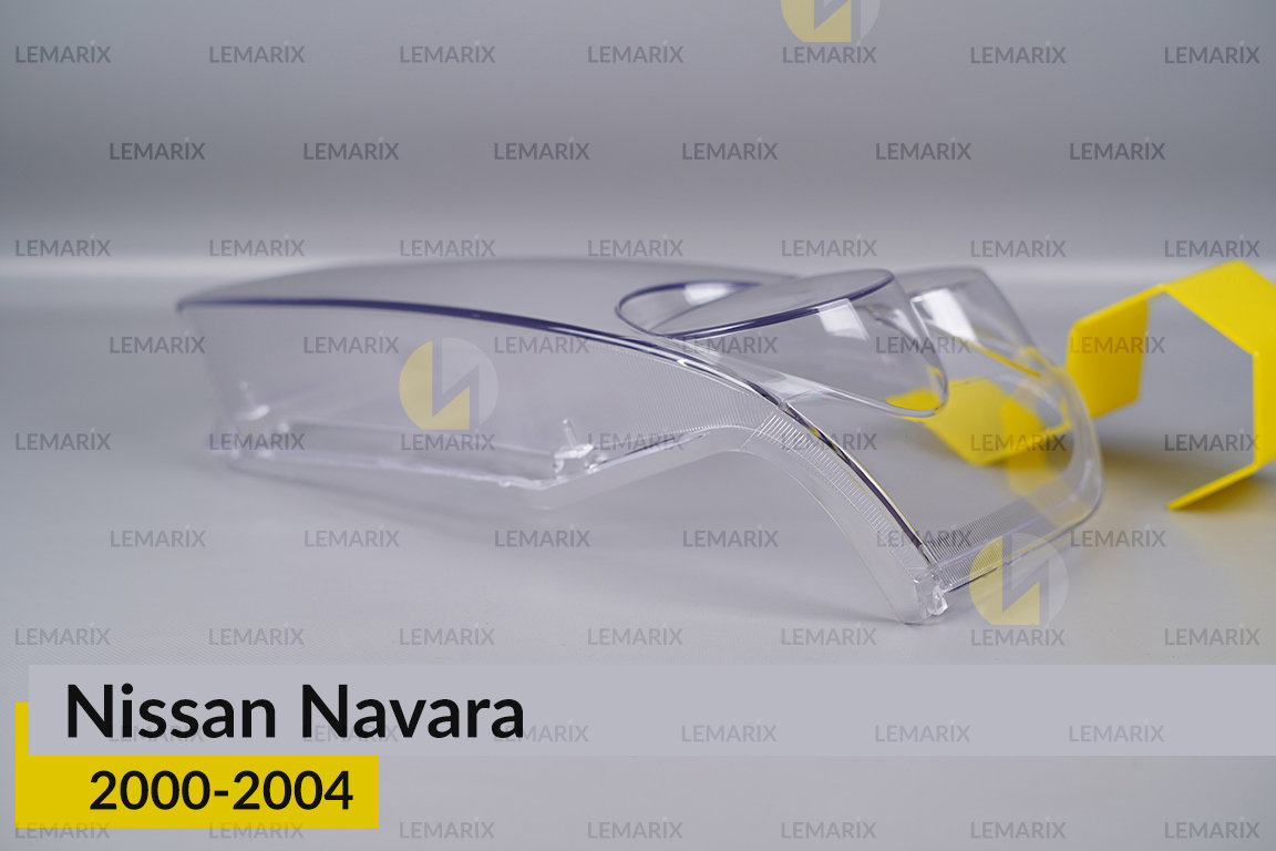 Стекло фары Nissan Navara (2000-2004) левое