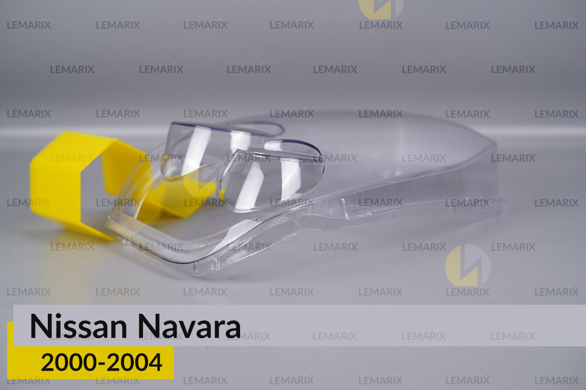 Стекло фары Nissan Navara (2000-2004) левое