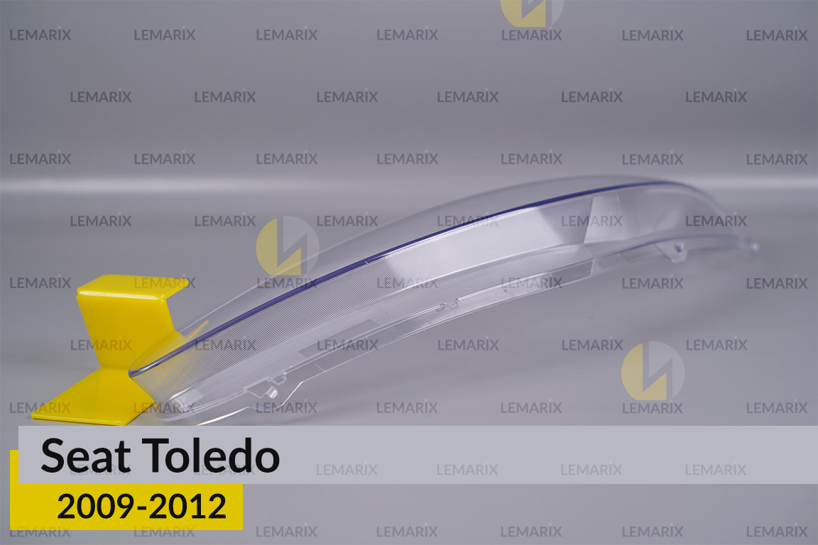 Скло фари Seat Toledo (2009-2012) ліве