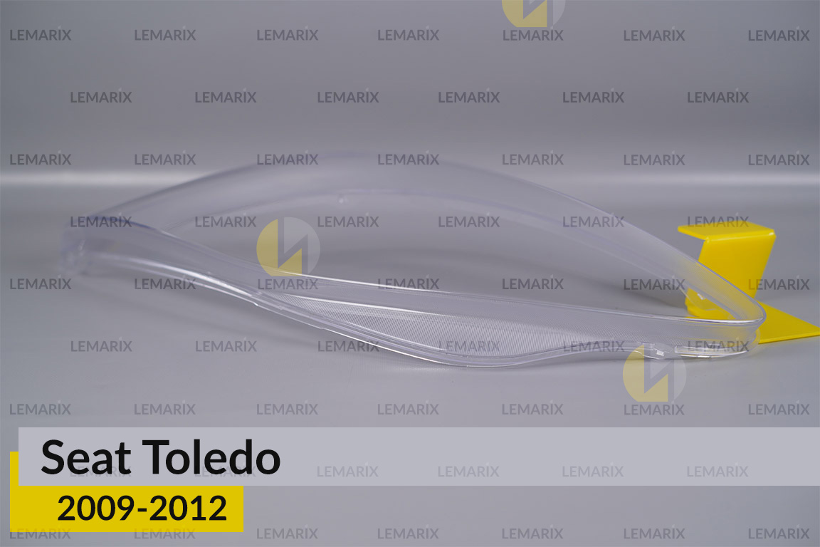 Скло фари Seat Toledo (2009-2012) ліве
