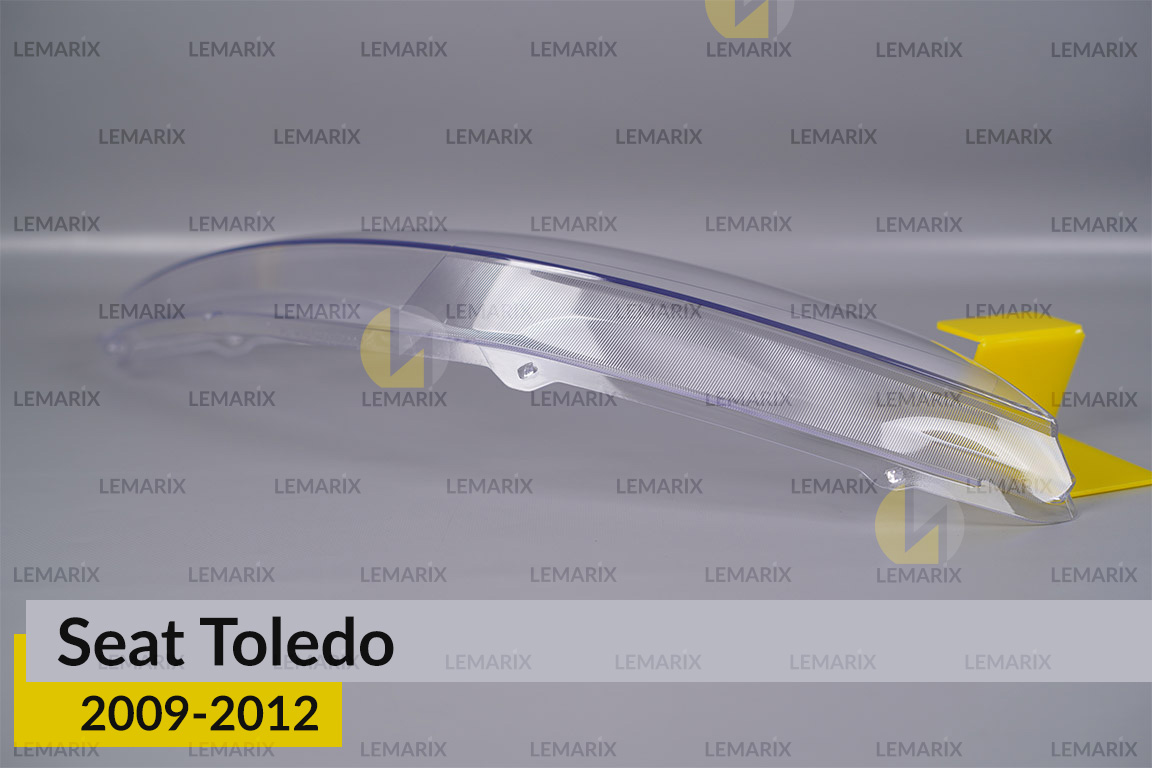 Скло фари Seat Toledo (2009-2012) ліве
