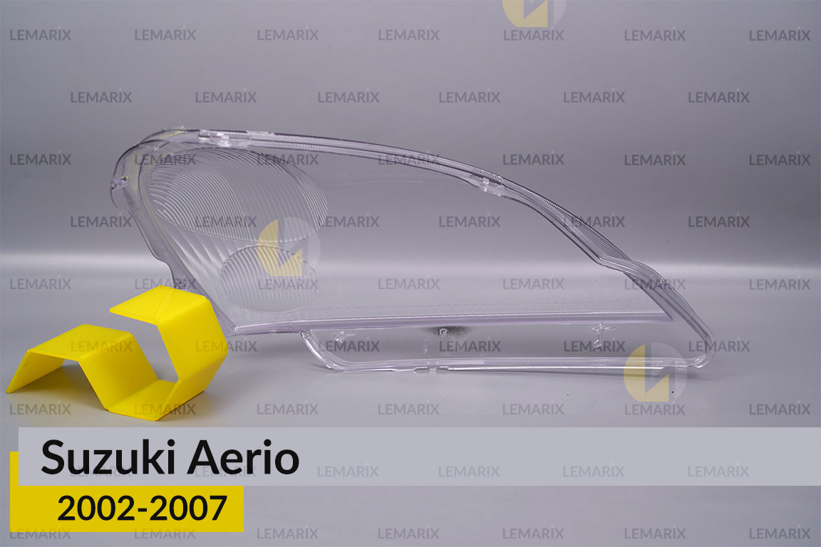 Скло фари Suzuki Aerio (2002-2007) ліве