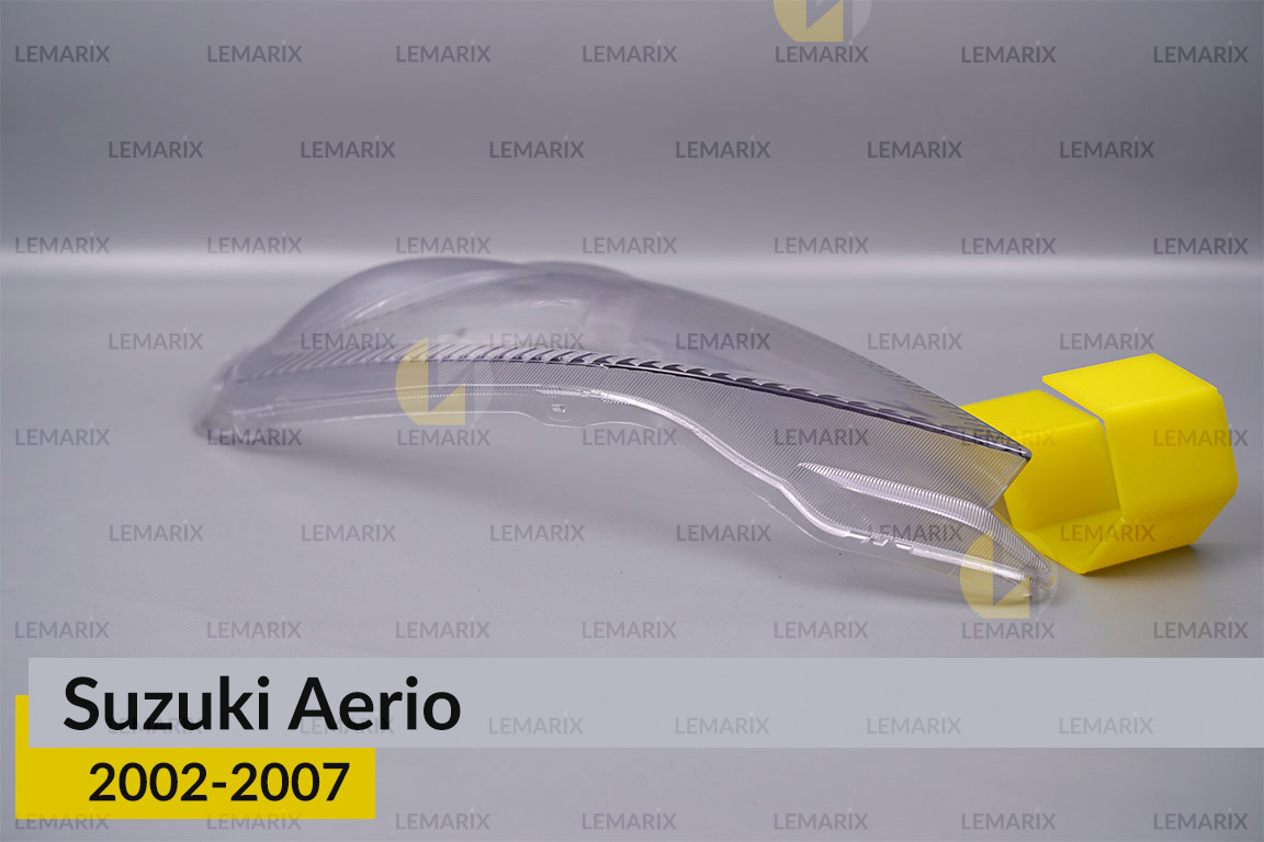 Скло фари Suzuki Aerio (2002-2007) ліве