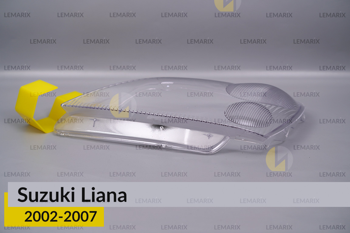 Стекло фары Suzuki Liana (2002-2007) левое